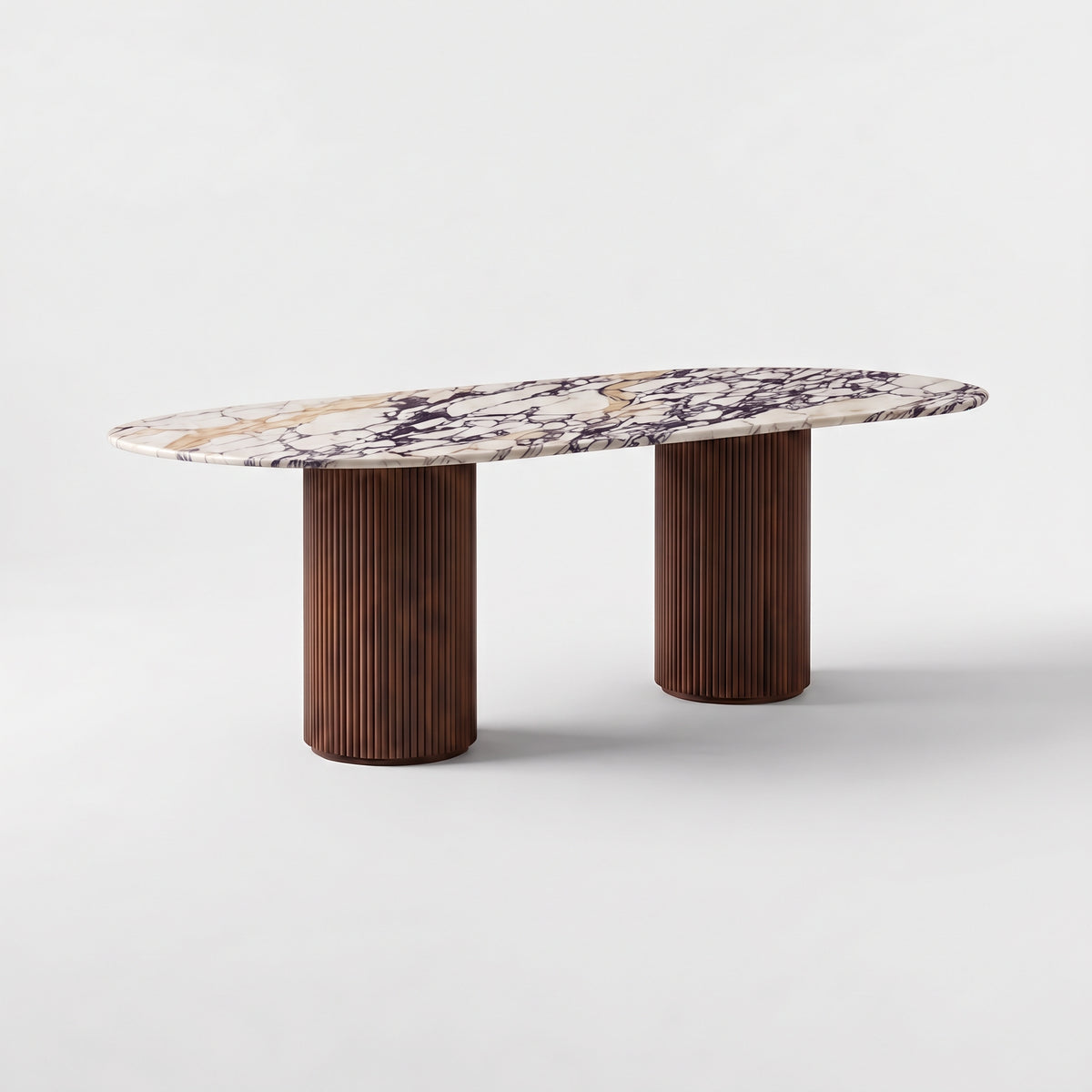 Charles oval dining table with a Calacatta Viola marble top and two fluted beech wood bases